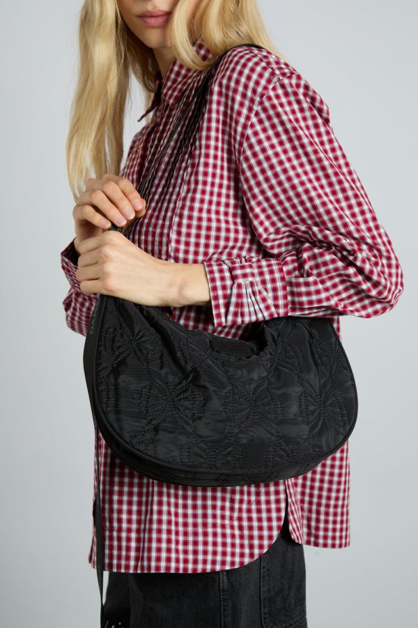 crescent bag with bow stitch detail