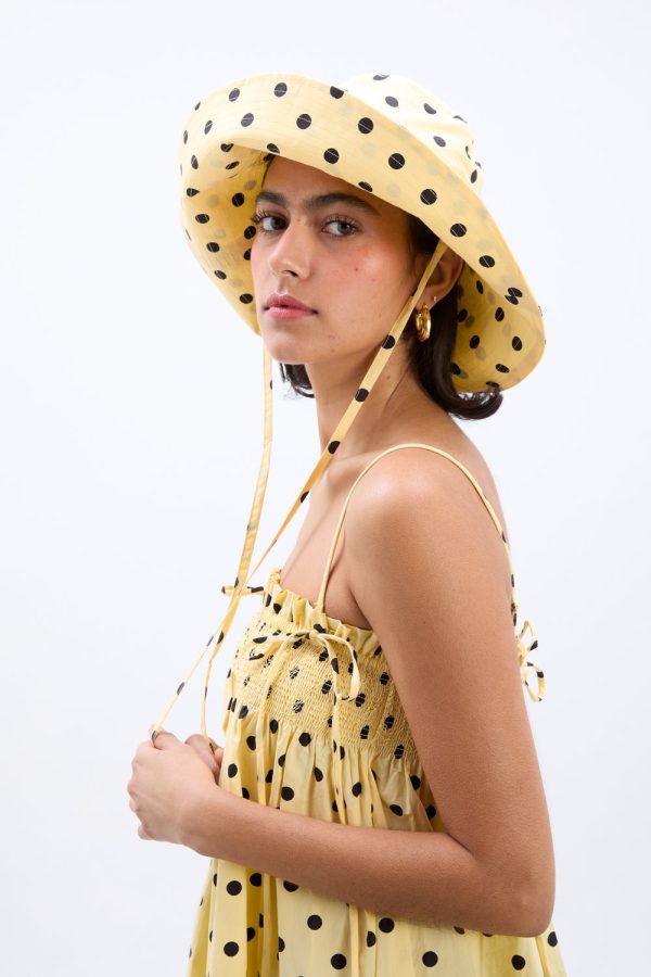 sunhat in butter yellow u0026 black polka dot